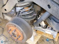 remove_wheel_jeep_wrangler_coil_suspension_lift.JPG