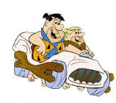 fredflintstonedrivingaroundwithbaldfeet-1.gif